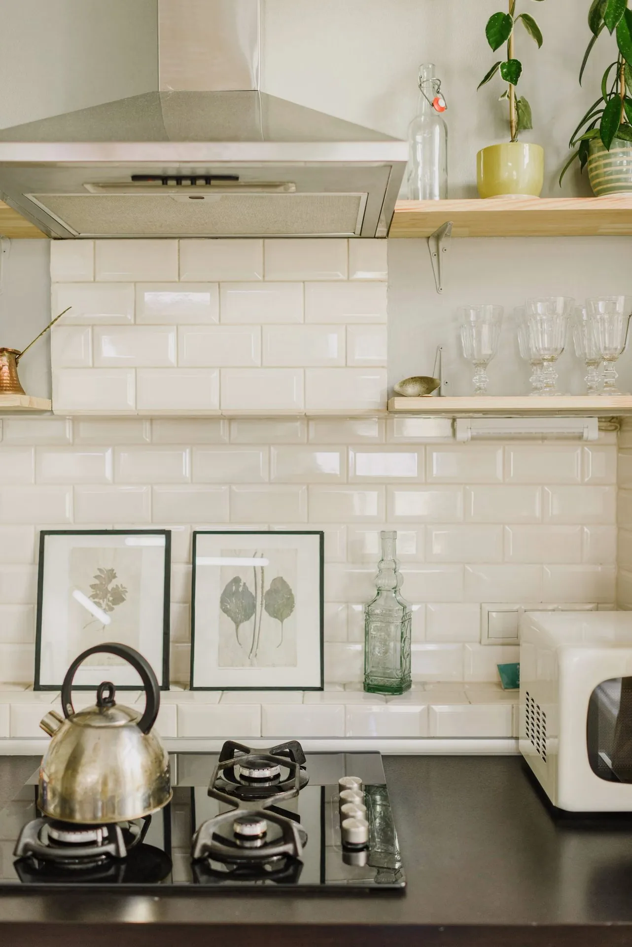 Photo of small kitchen appliances neatly organized on a countertop shelf