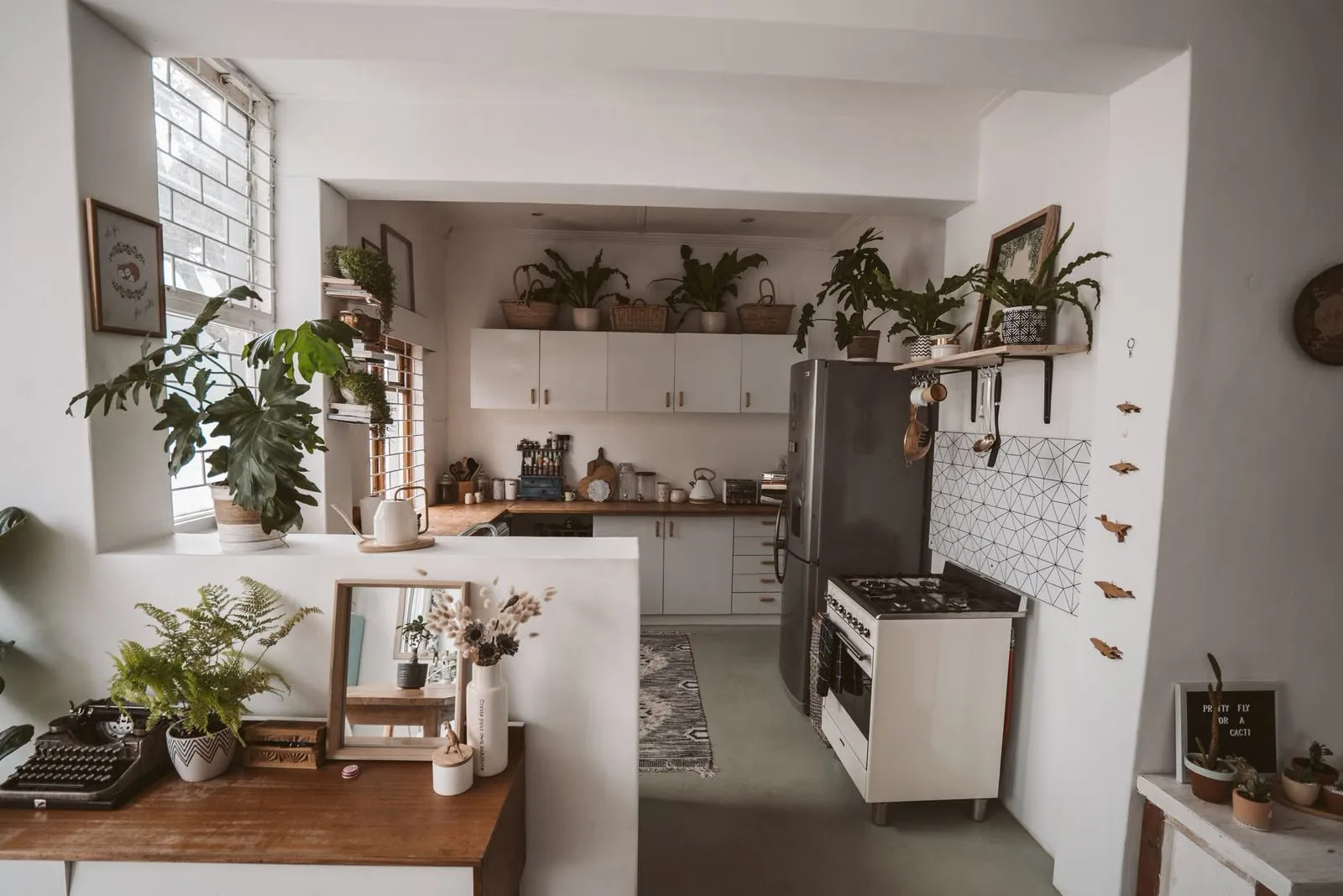 Photo of a small, bright, organized rental kitchen